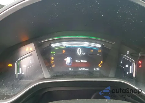 2021 Honda Cr-V Touring z USA, uszkodzony, nr VIN 7FART6H90ME031491